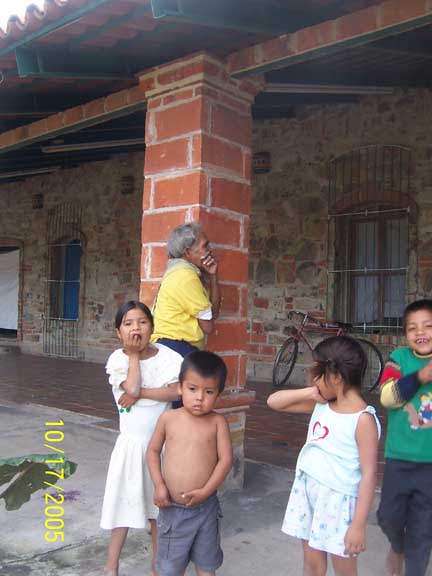 Huichol children with grampa in the back
